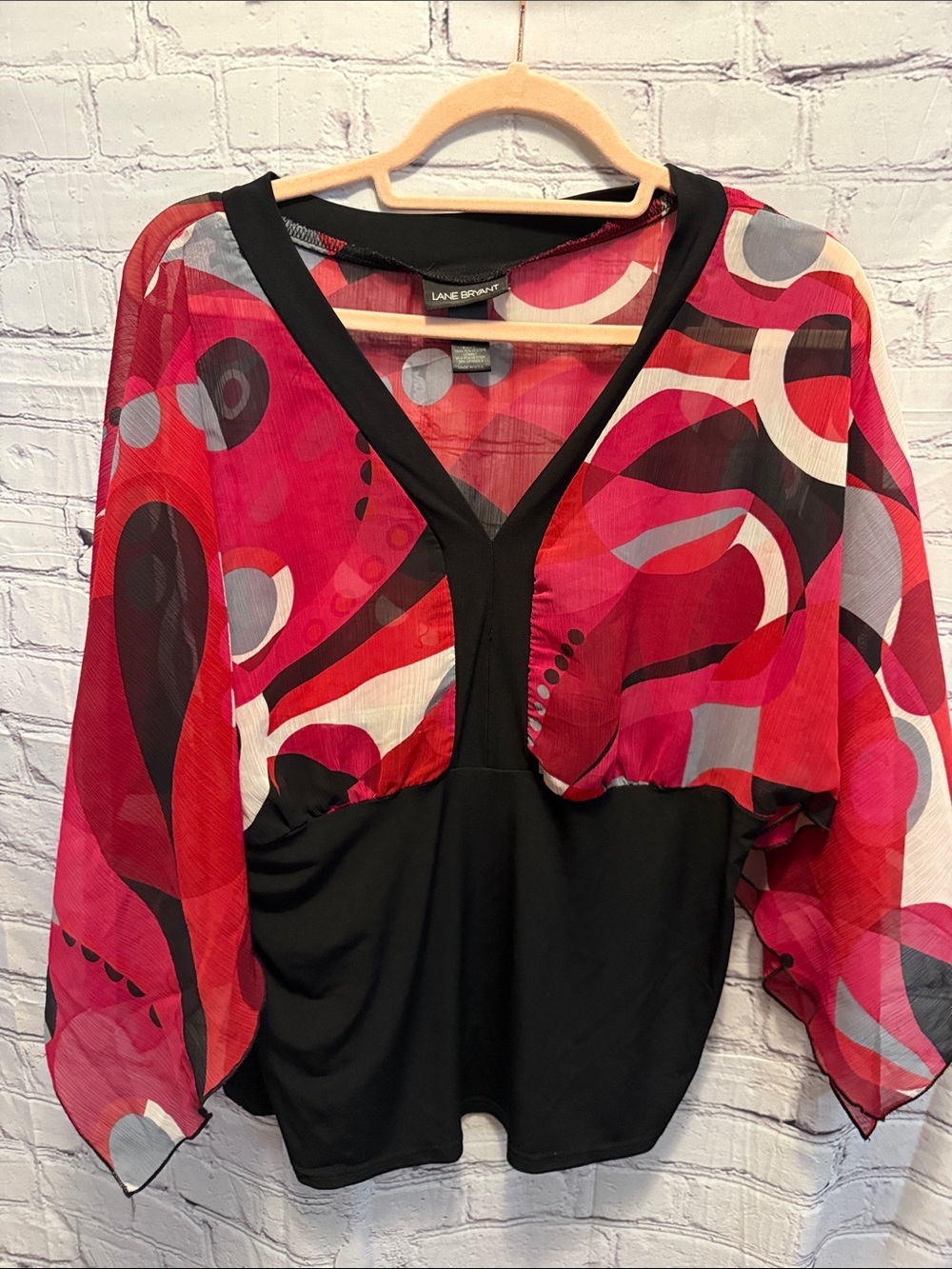 Lane Bryant Black Top with Bold Red Abstract Mesh Sleeves